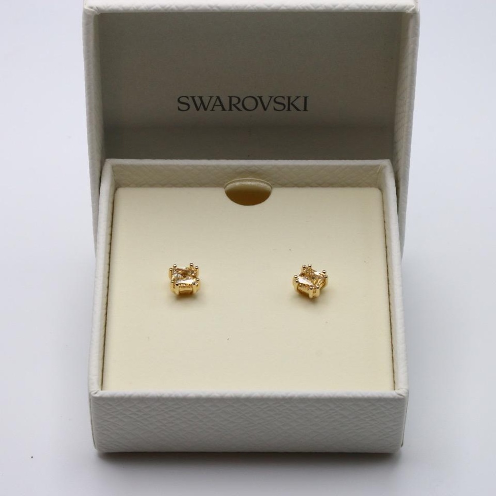 NIB Swarovski Square cut yellow gold tone earrings.